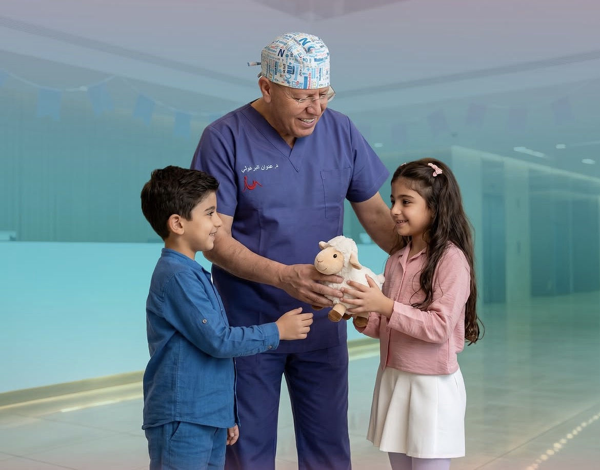 Dr. Edwan Barghouthi with young patients at AlHiba IVF Center